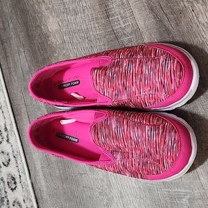 Pink slip on sneakers